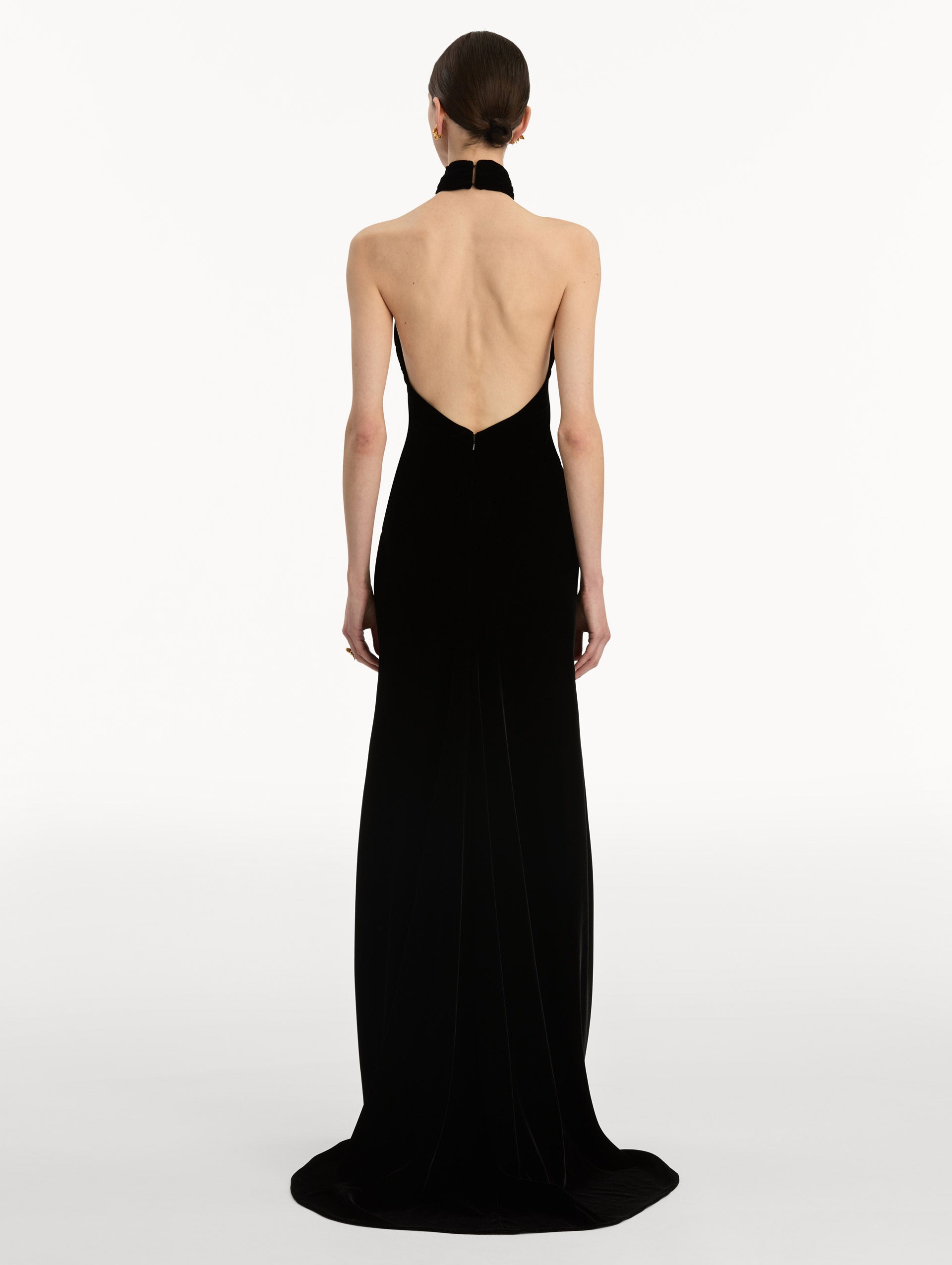 Black Gold Leaf Embroidered Velvet Gown with a wrap halter neckline and keyhole. Back View.