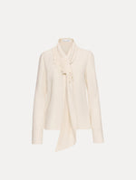 Ivory Foxglove Tie-Neck Georgette Blouse featuring a floral applique and long sleeves.