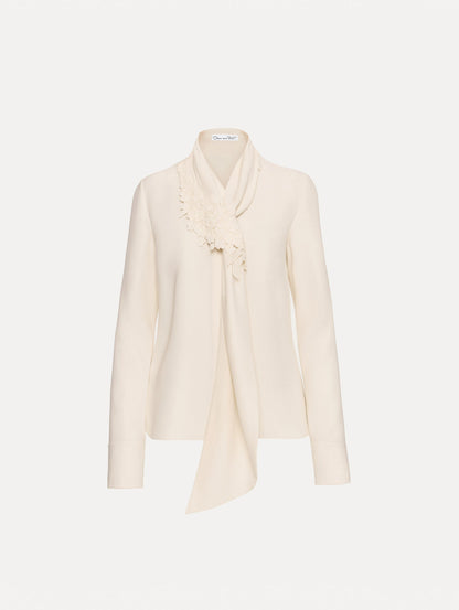 Ivory Foxglove Tie-Neck Georgette Blouse featuring a floral applique and long sleeves.