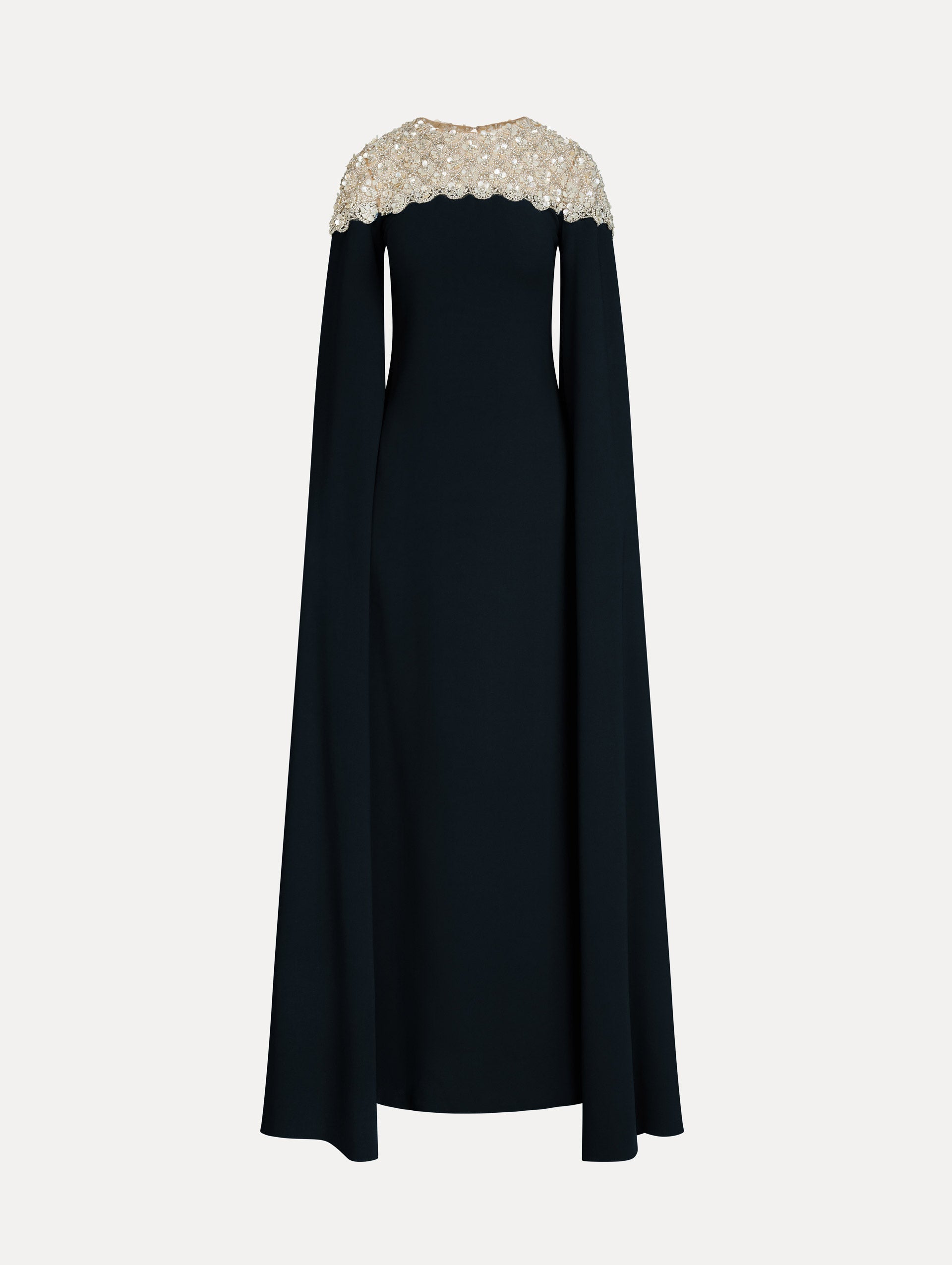 Navy Embroidered Caftan with ivory embroidered neckline and floor-length draped silhouette. Front View.