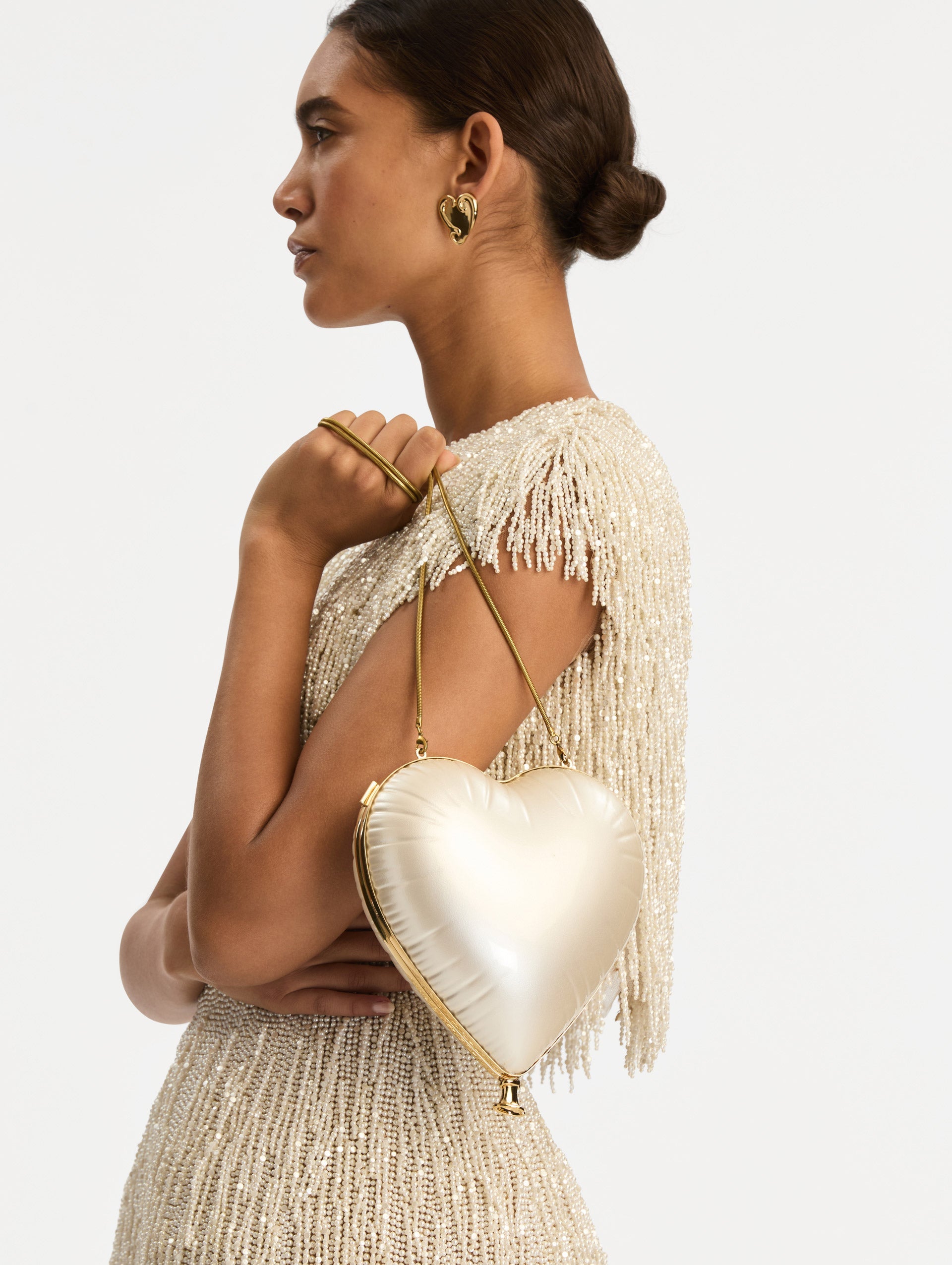 Pearl Heart Ballon Bag featuring a gold chain strap and metallic trim. Front View.