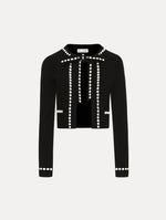 Black and White Bubble Trim Cardigan featuring white beaded trim, long sleeves, and a tie-neck collar.