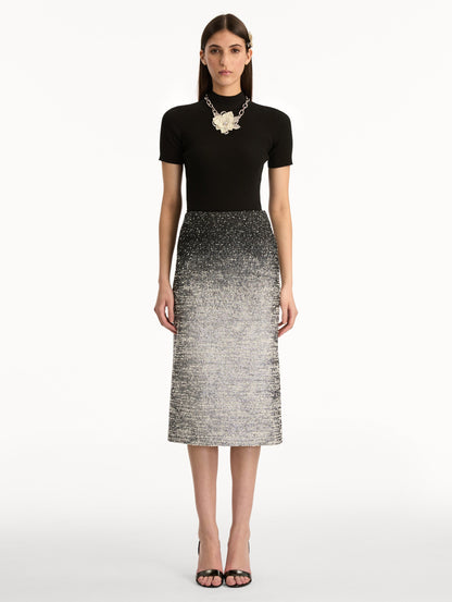 Black and Ivory Ombré Lurex Bouclé Jacquard Skirt featuring a fitted silhouette and a textured metallic finish. Front View.