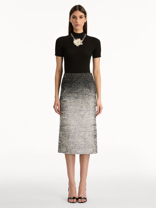 Black and Ivory Ombré Lurex Bouclé Jacquard Skirt featuring a fitted silhouette and a textured metallic finish. Front View.