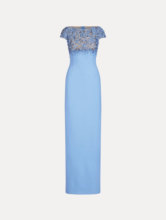Gown in the color Hydrangea Light Blue with cap sleeves, bateau neckline, sheer, crystal floral embroidery, and column silhouette.