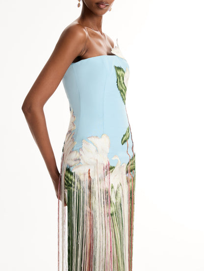 Strapless, Floor length silk faille gown with Chiné Cyclamen motif on threadwork fringe. Clean lines and a fitted bodice frame the embroidery. Close Up Side View.