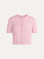 Knit short sleeve cardigan in the color light pink with ribbed hem and flower button front.