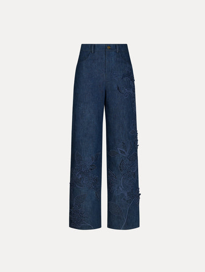 Pants in a Denim, Navy Blue color with button closure, belt loops, and lace floral detail.