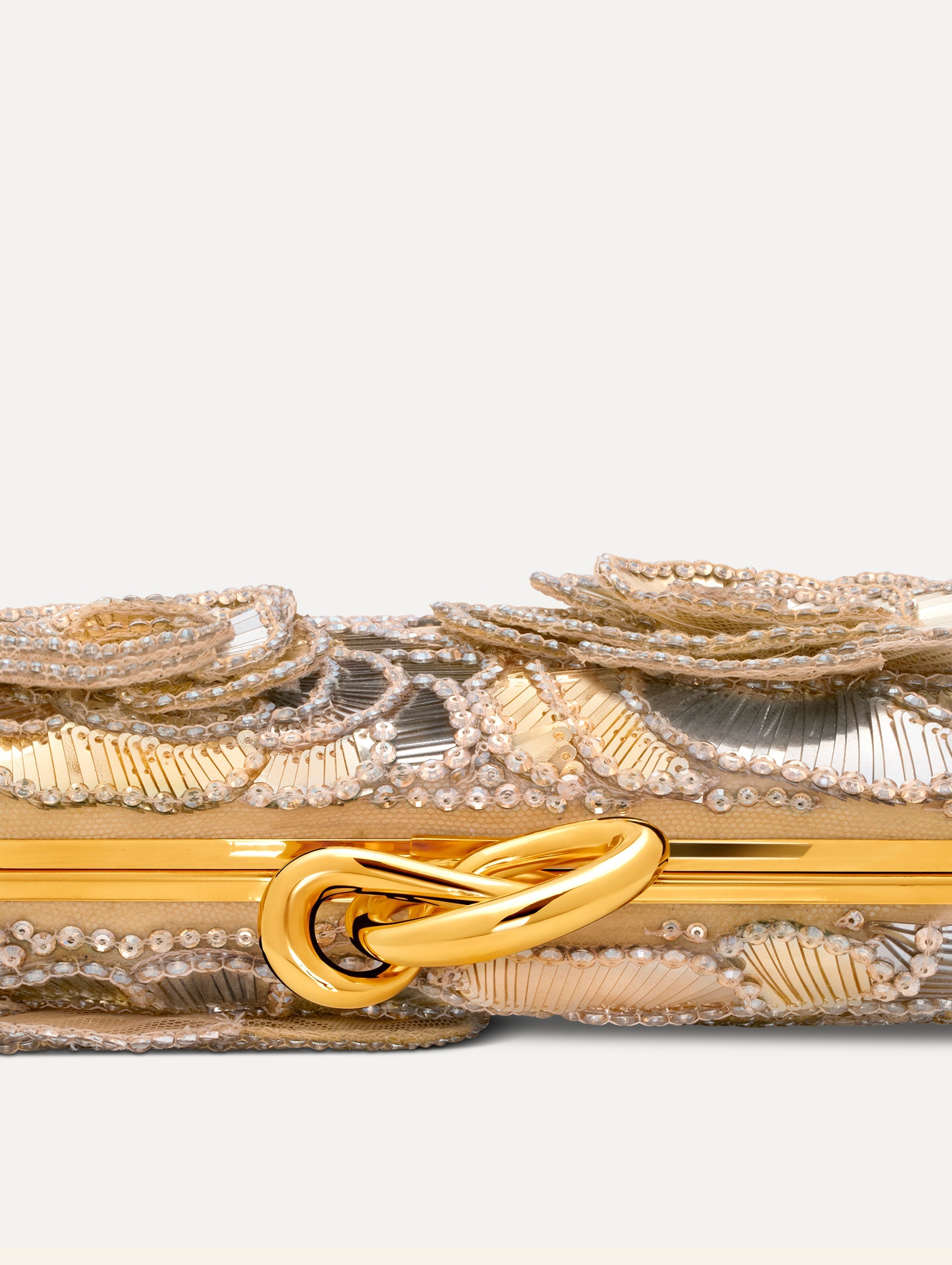 Silver Crystal Pavé Knot Minaudière with gold hardware and an O motif clasp. Zoom View.