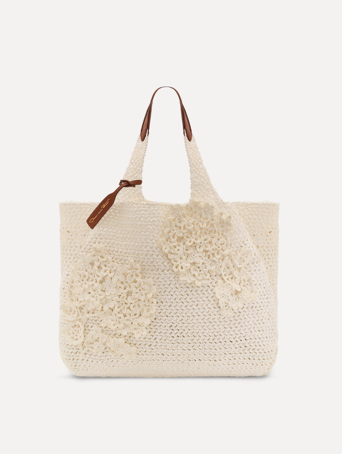 White Topaz in Crochet Raffia with white leather handle and crochet embroidered flower motifs. Front View.