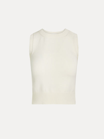 Sleeveless, halter neck, classic knit tank in soft ivory. Front View.