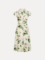 Chiné Cyclamen Cotton Poplin Cap Sleeve Dress in the colors White and Ivory, featuring a tailored bodice, flared midi skirt, short sleeves, concealed button front, matching belt at waist, and softly blurred floral print.