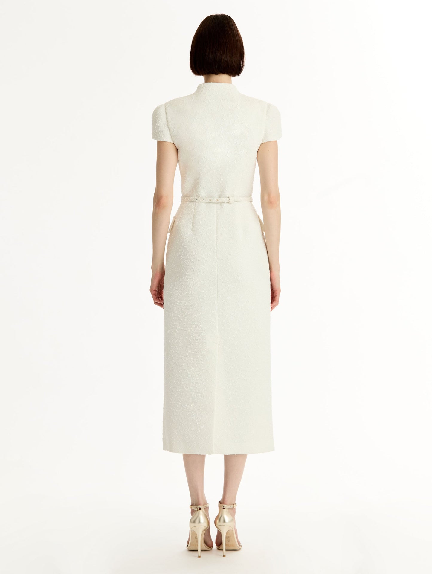 Ivory Cyclamen-Detailed Wool Tweed Dress with belted waist and floral motif gold buttons. Back View.
