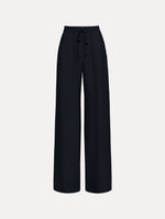 The Silk Georgette Drawstring Pant in the color navy blue featuring straight, wide-legs and an elastic waistband finished with a drawstring tie. Front View.