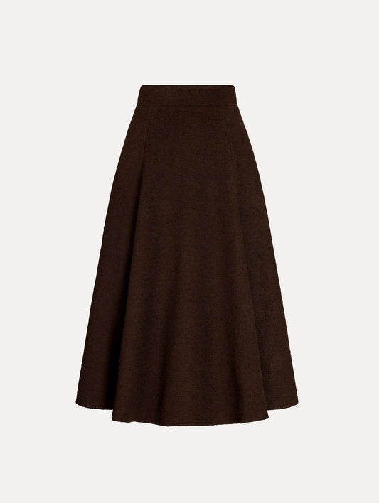 Wool Tweed Pleated Skirt in the color Mahogany Brown, featuring a flared, midi length silhouette.