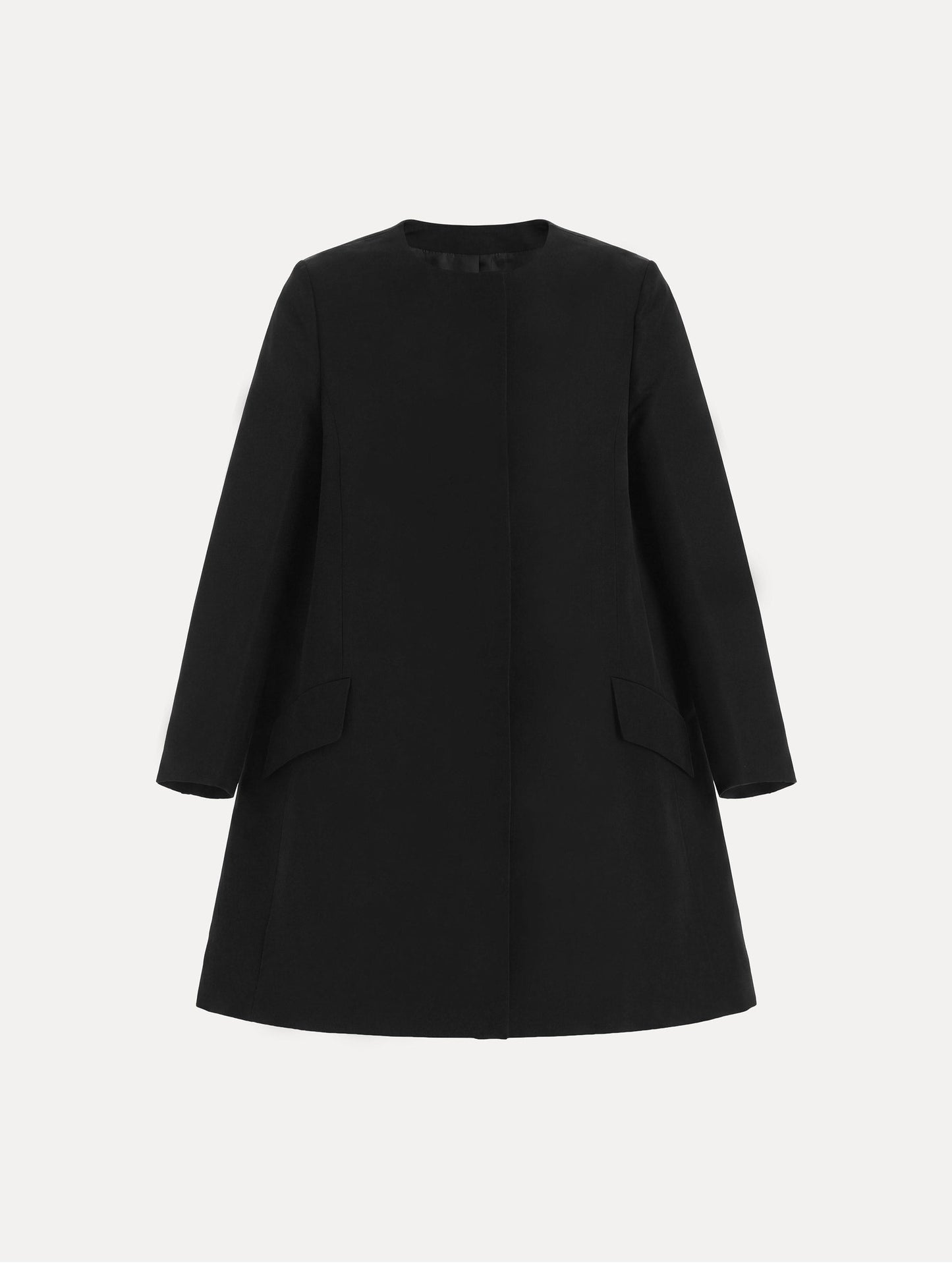 The Silk Faille Short Coat with flap pockets in the color black.