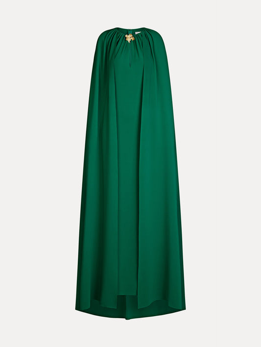 Cyclamen-Detailed Georgette Caftan in the color Malachite Green with soft gathers at neckline, cape-like shape, and key-hole detail with gold flower focal point.