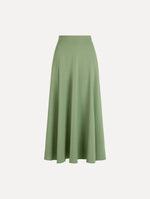 The Silk Georgette Midi Skirt in the color green featuring a high-waist and classic, flowing skirt. Front View.