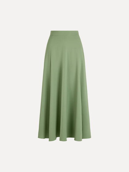 The Silk Georgette Midi Skirt in the color green featuring a high-waist and classic, flowing skirt. Front View.