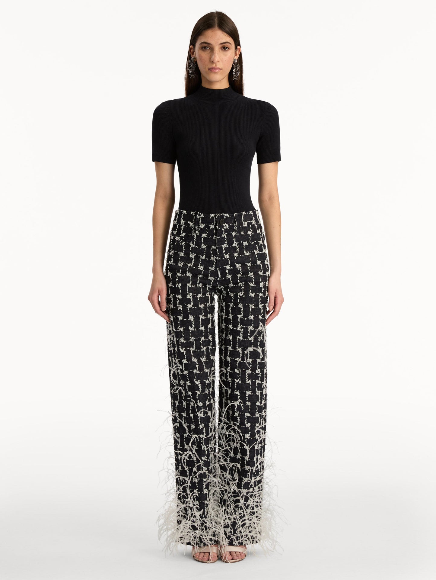 Black and White Woven Denim Jacquard Pant with feather detailing. Front View.