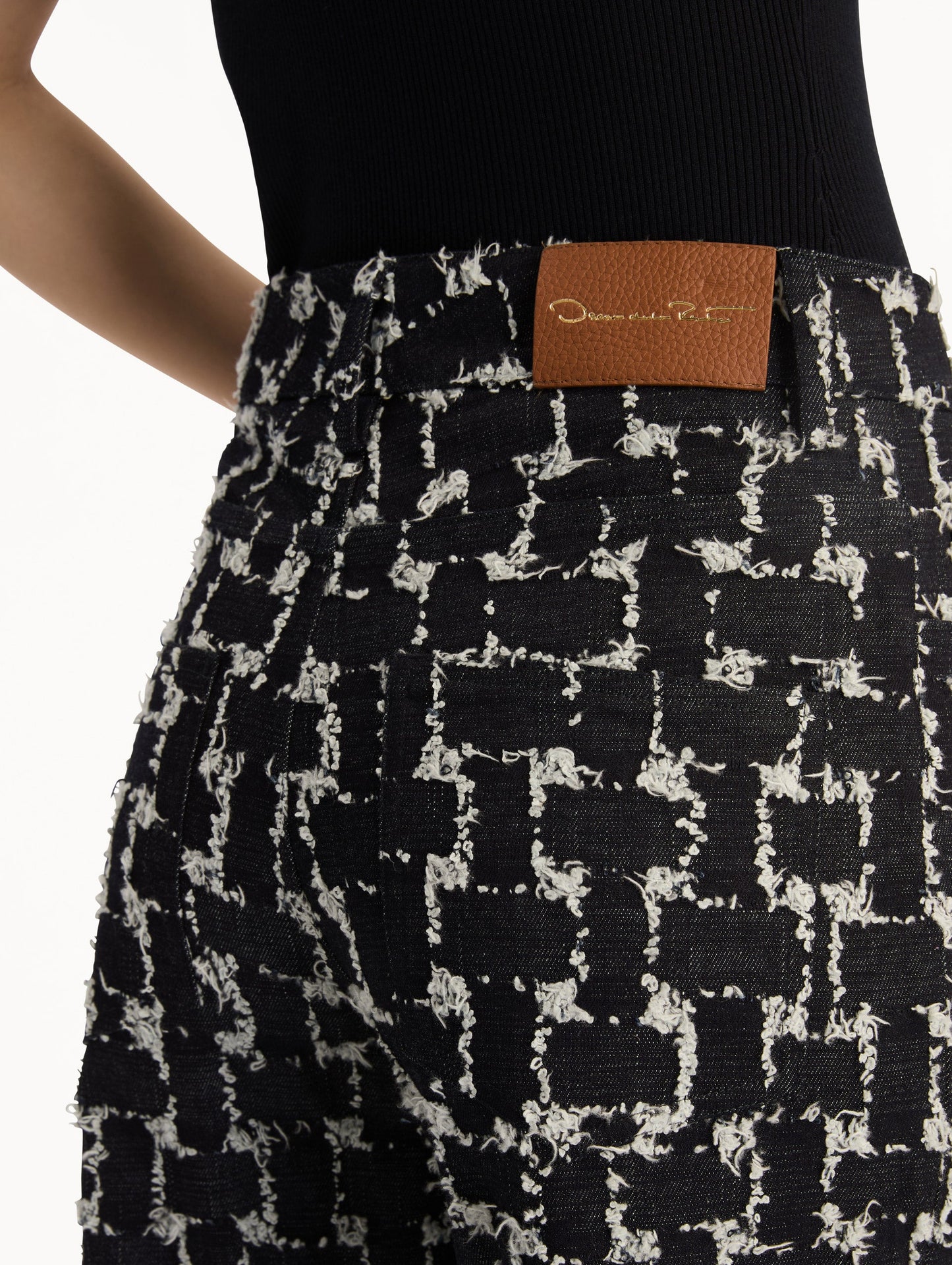 Black and White Woven Denim Jacquard Pant with feather detailing. Zoom View.
