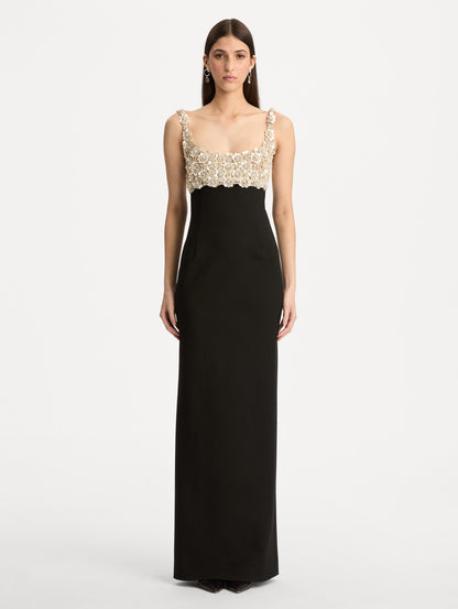Black Embroidered Sleeveless Gown with a form fitting, floor length silhouette and an embellished bodice. Front View.