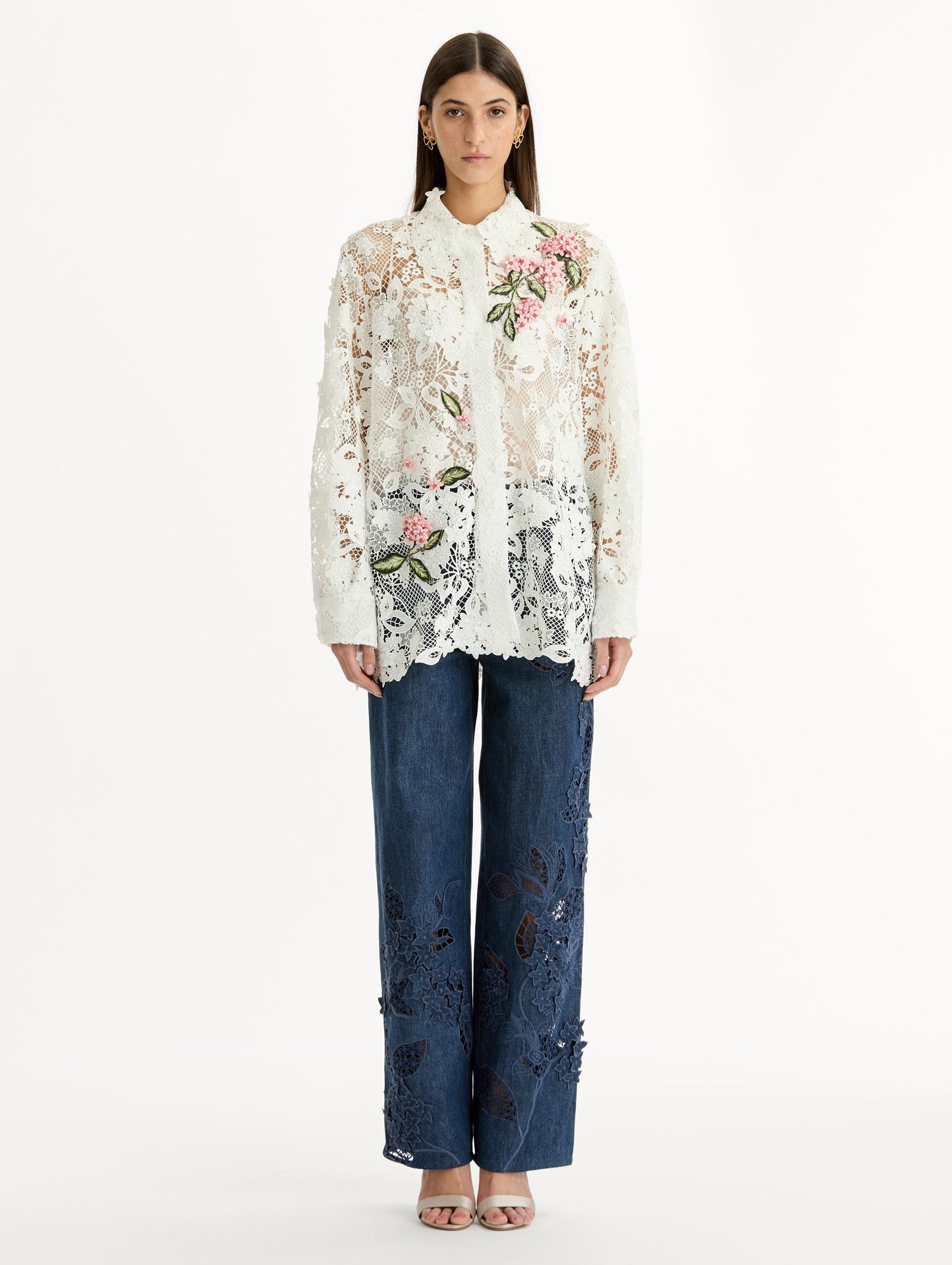 Long Sleeve, Button Up Blouse with Delicate guipure lace and intricate porcelain flower embroidery. White with pink florals. Front View.
