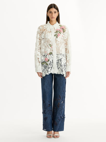 Long Sleeve, Button Up Blouse with Delicate guipure lace and intricate porcelain flower embroidery. White with pink florals. Front View.