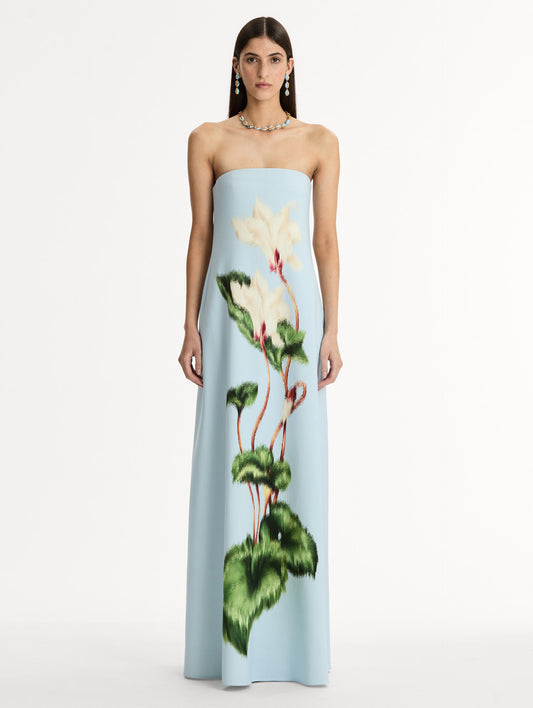 Strapless Floor Length Gown in Pale Blue with trapeze silhouette. Chiné Cyclamen motif blooms with blurred edges. Front View.