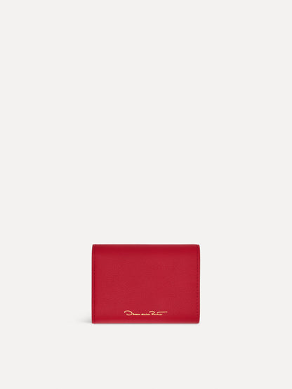 Red Tri-Fold Wallet featuring a gold O motif clasp. Back View.