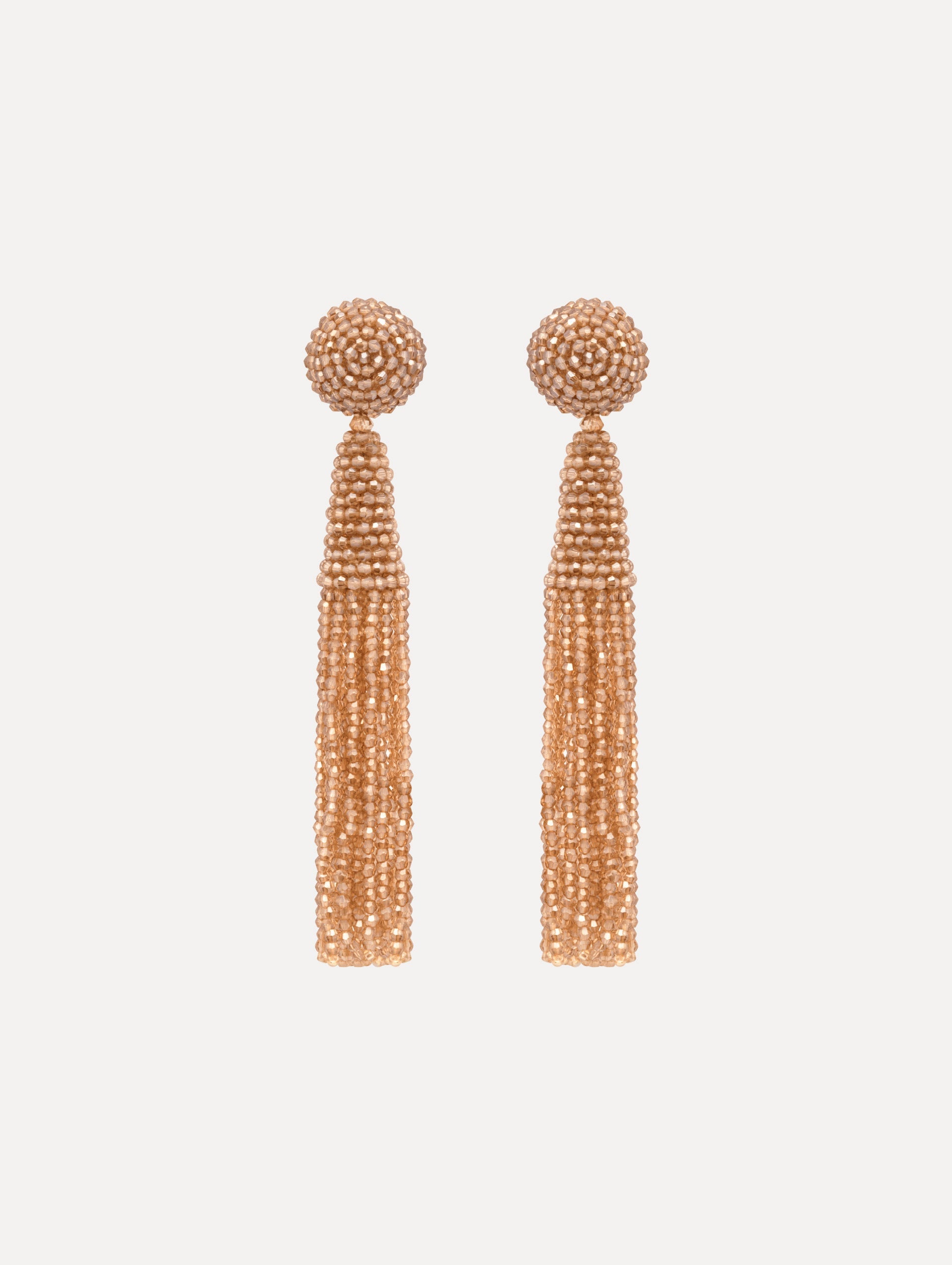 The Conical Tassel Clip-On Earrings in Champagne.