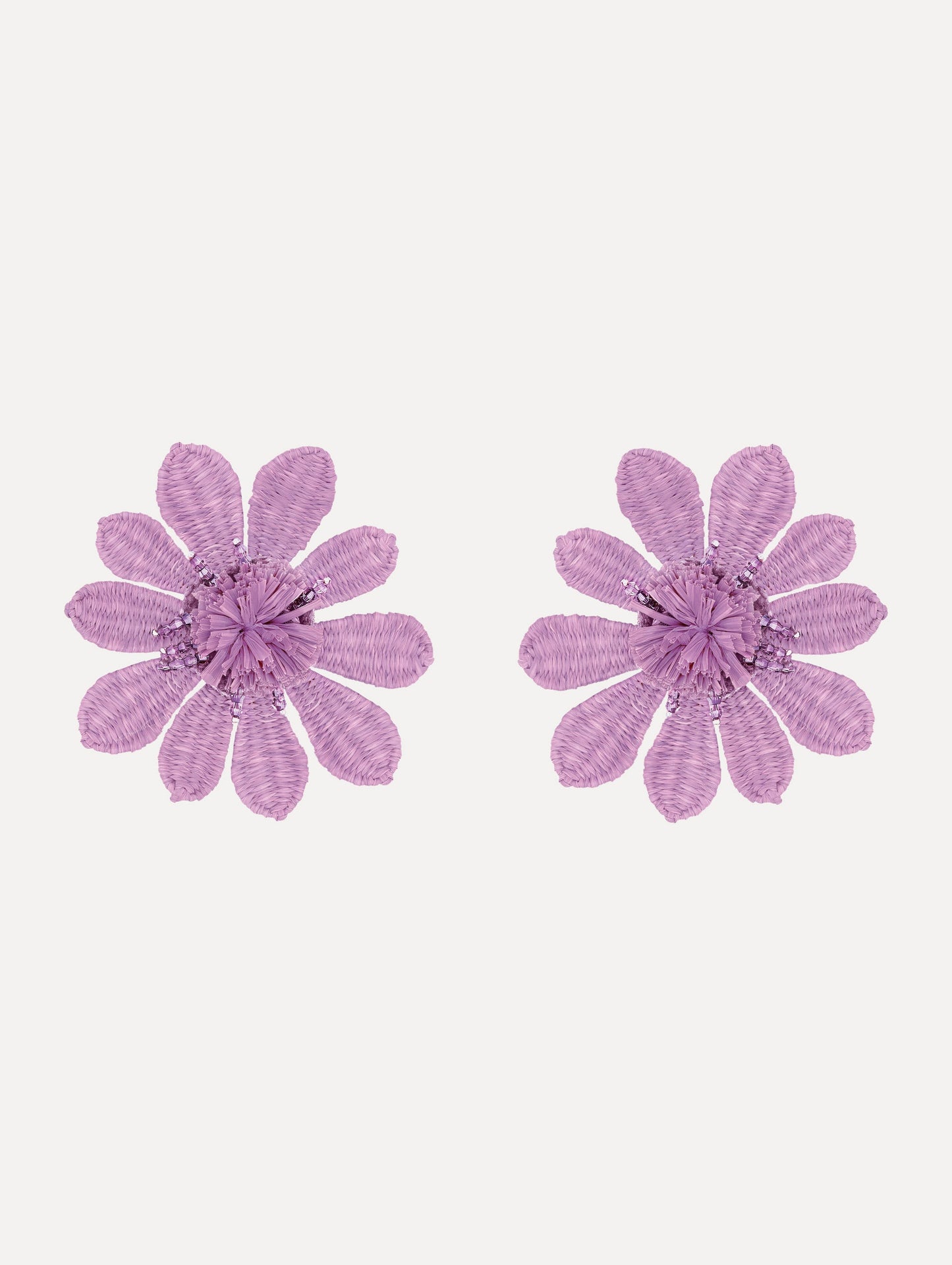 The Woven Raffia Flower Clip-On Earrings in Lilac.