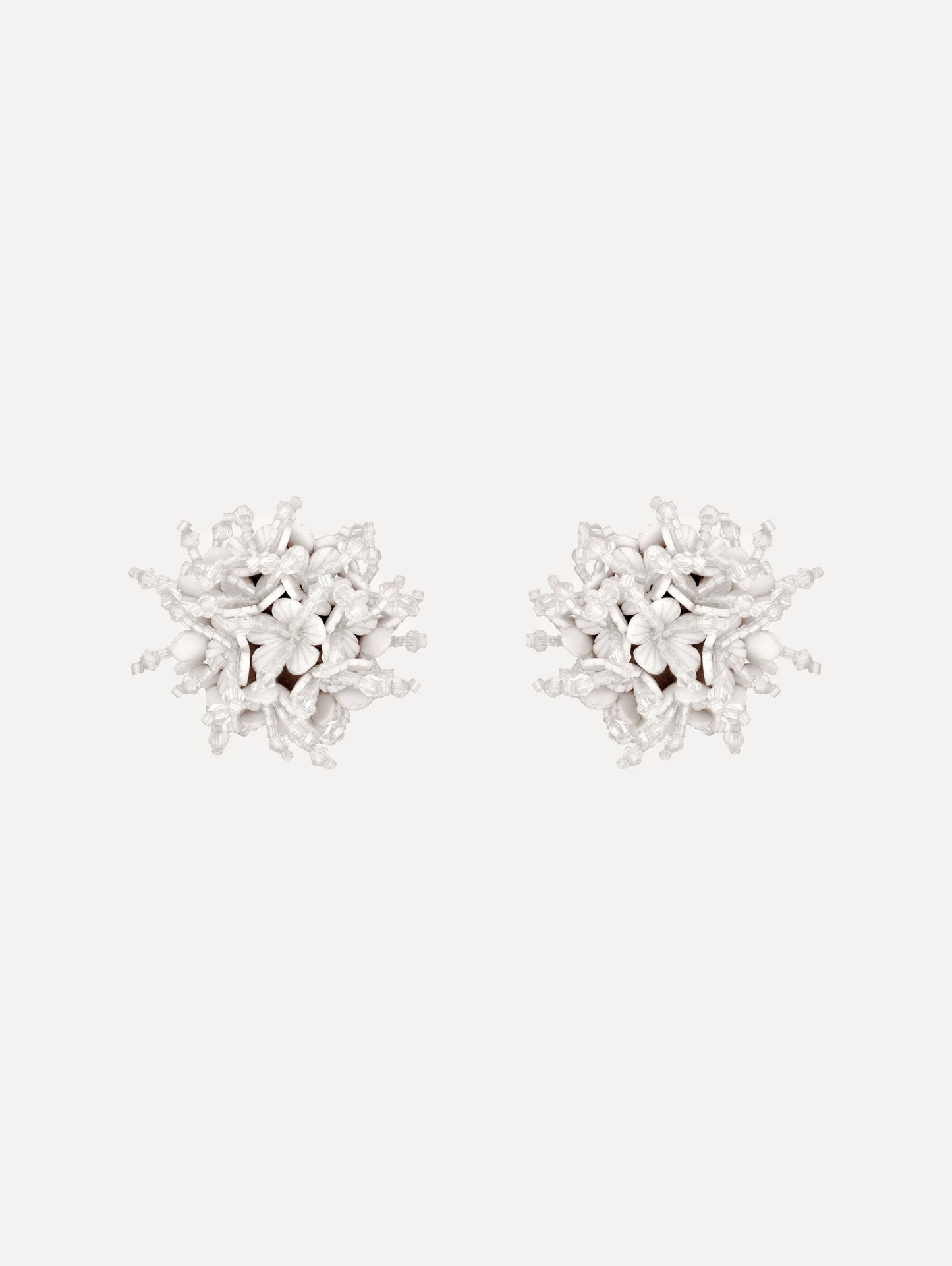 The Firework Clip-On Earrings in White.