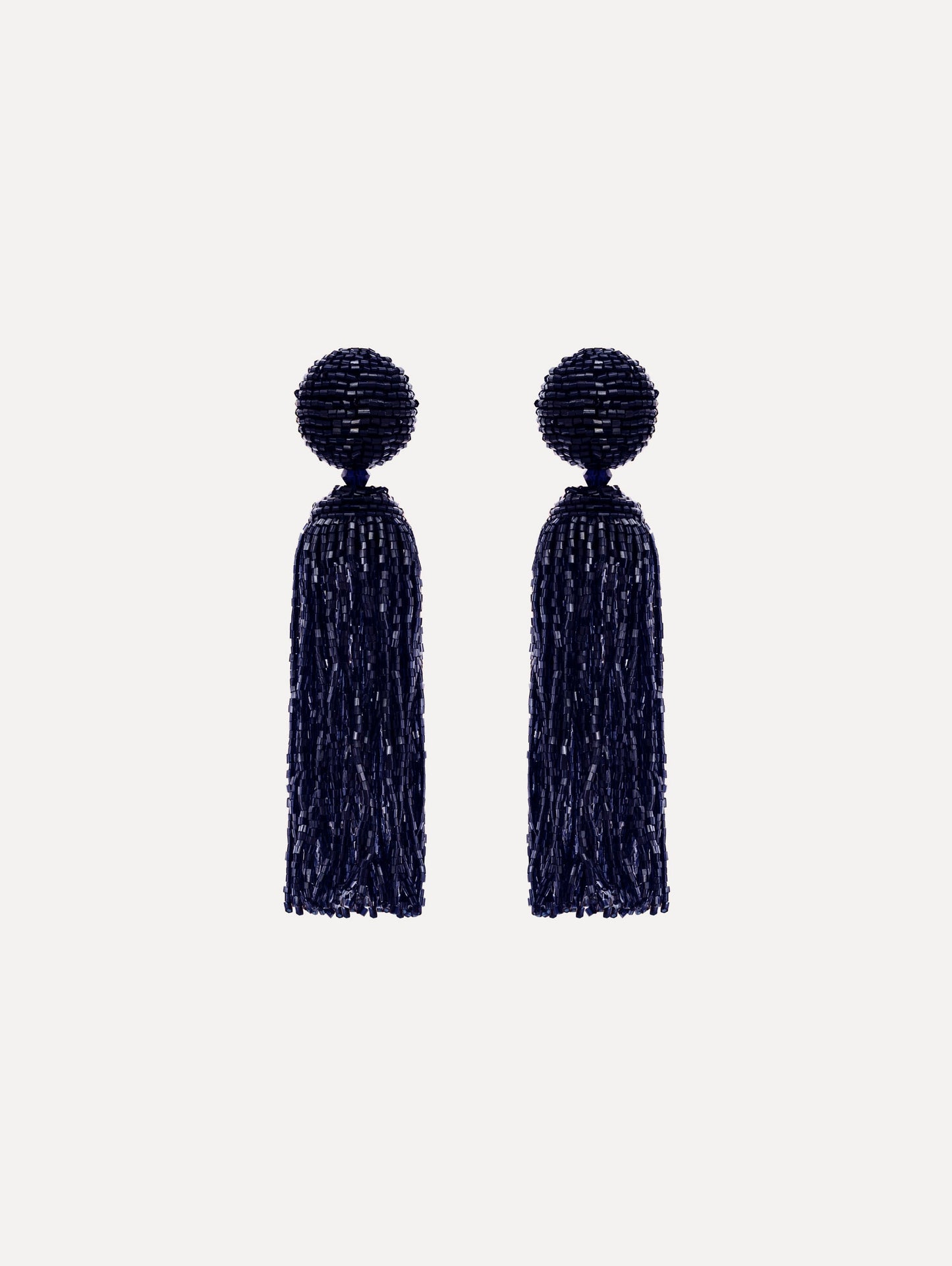 The Metallic Beaded Tassel Clip-On Earrings in Navy.