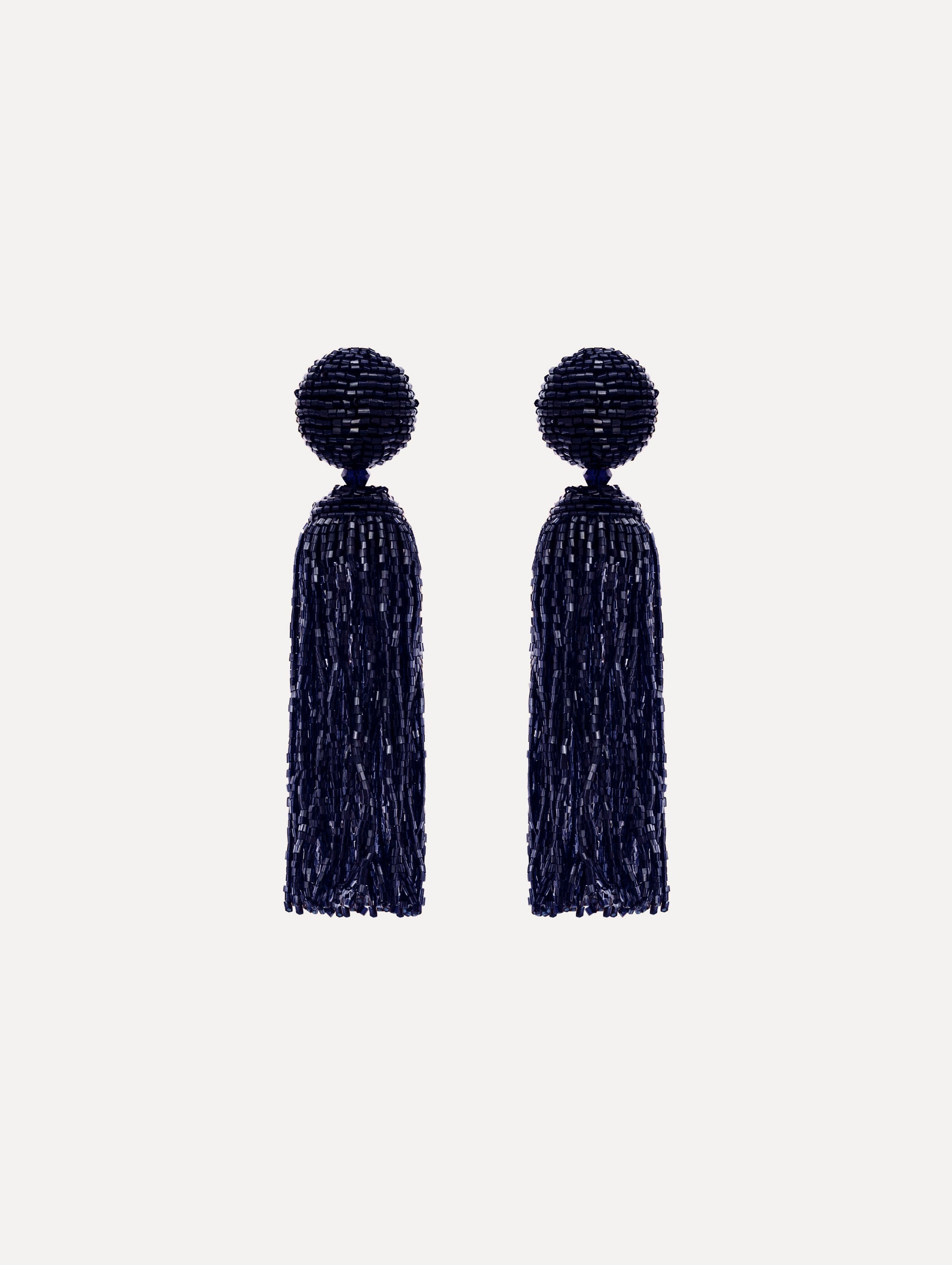 The Metallic Beaded Tassel Clip-On Earrings in Navy.