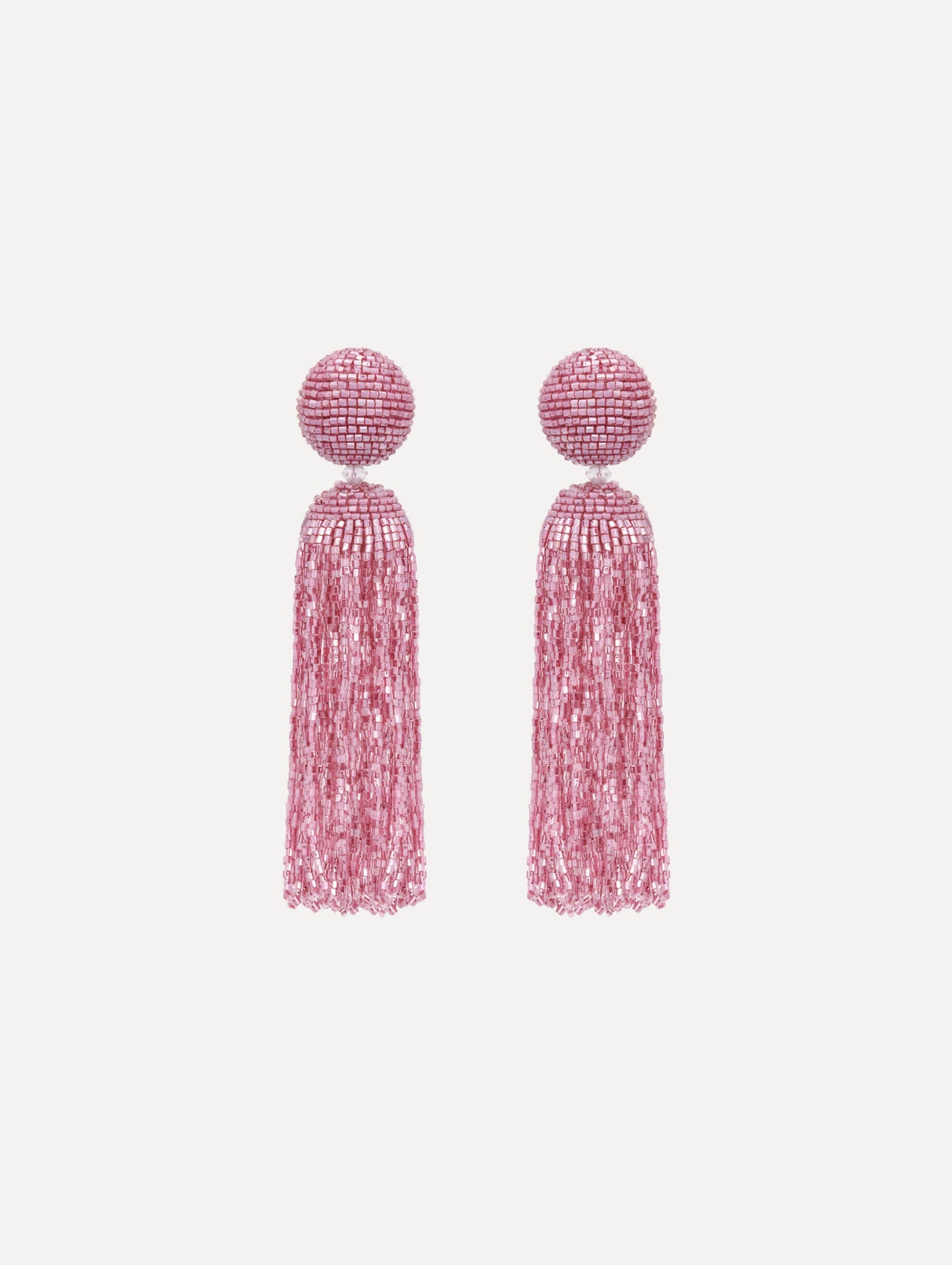 The Metallic Beaded Tassel Clip-On Earrings in Pink.