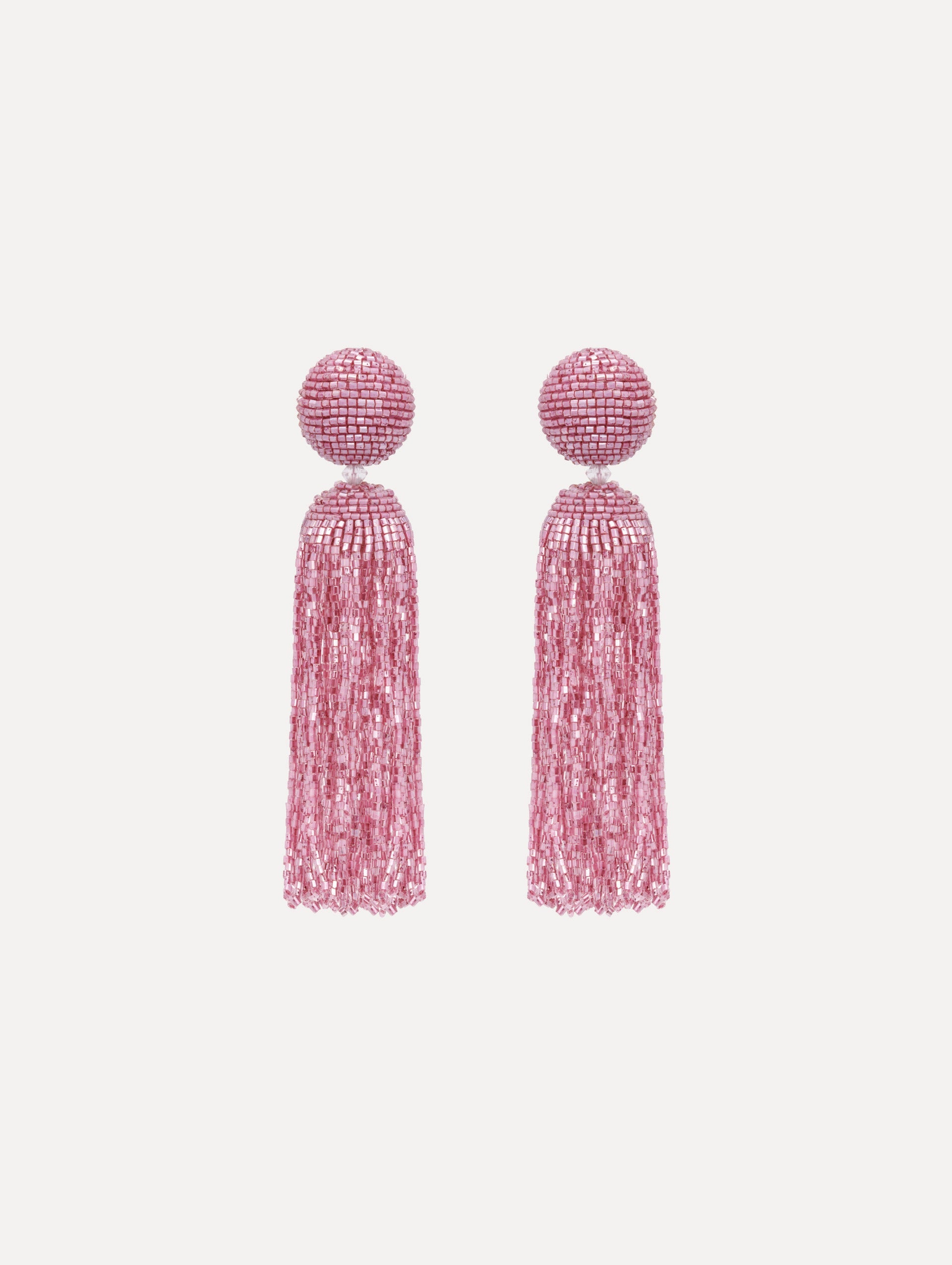 The Metallic Beaded Tassel Clip-On Earrings in Pink.