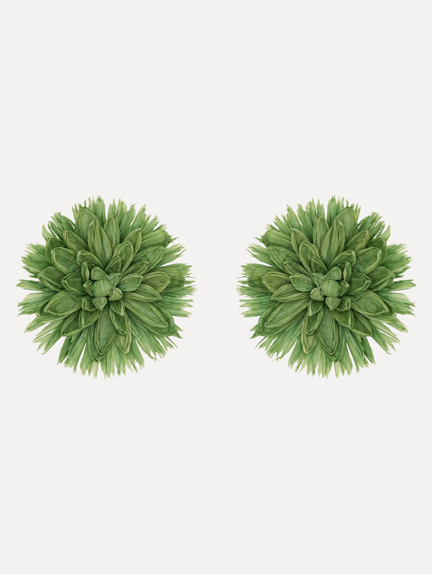 The Raffia Flower Clip-On Earrings in Green.