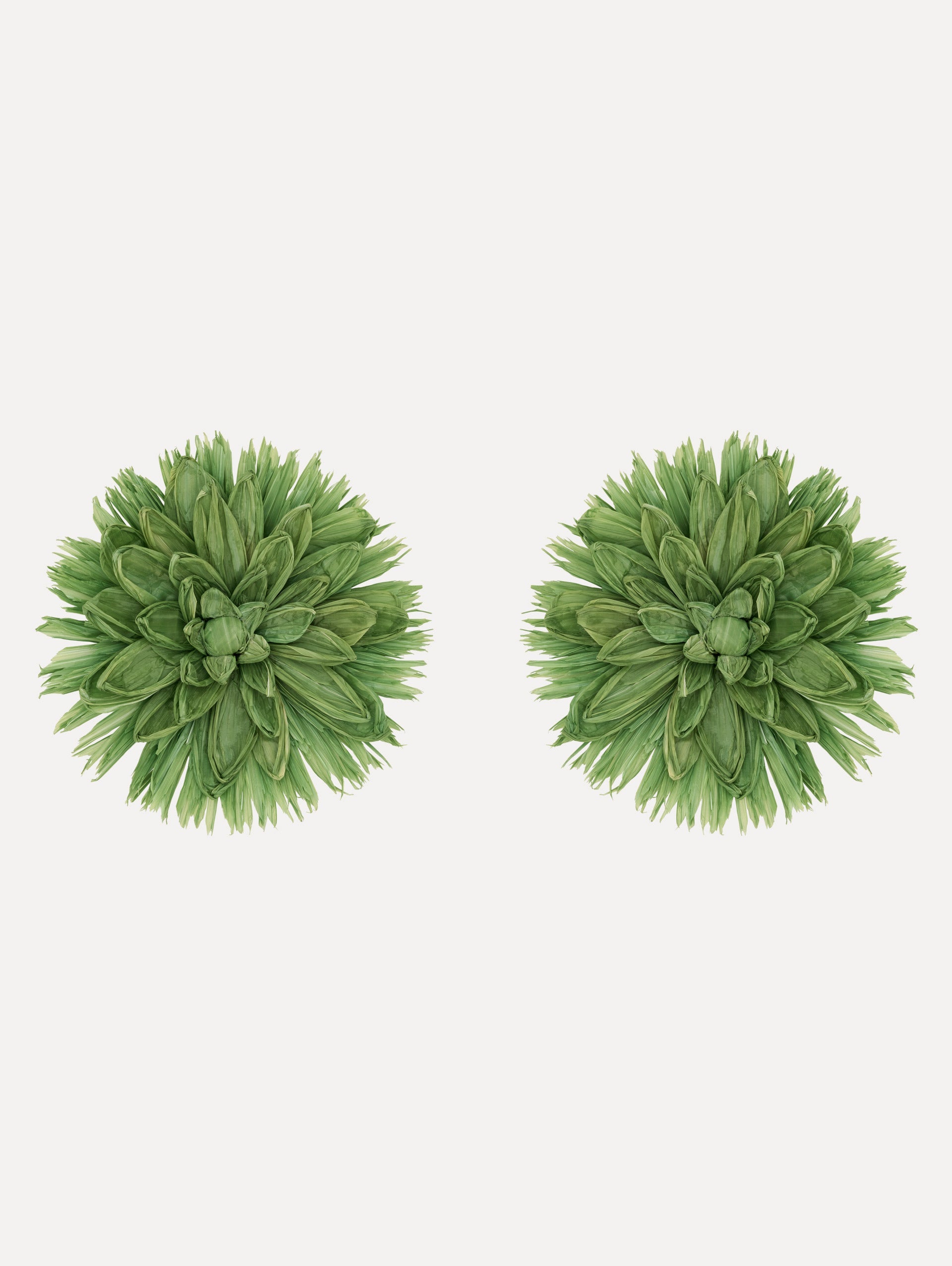 The Raffia Flower Clip-On Earrings in Green.