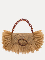 The Raffia Fringe O Pochette in the color natural with fringe detailing and a tortoise-accented O clasp.