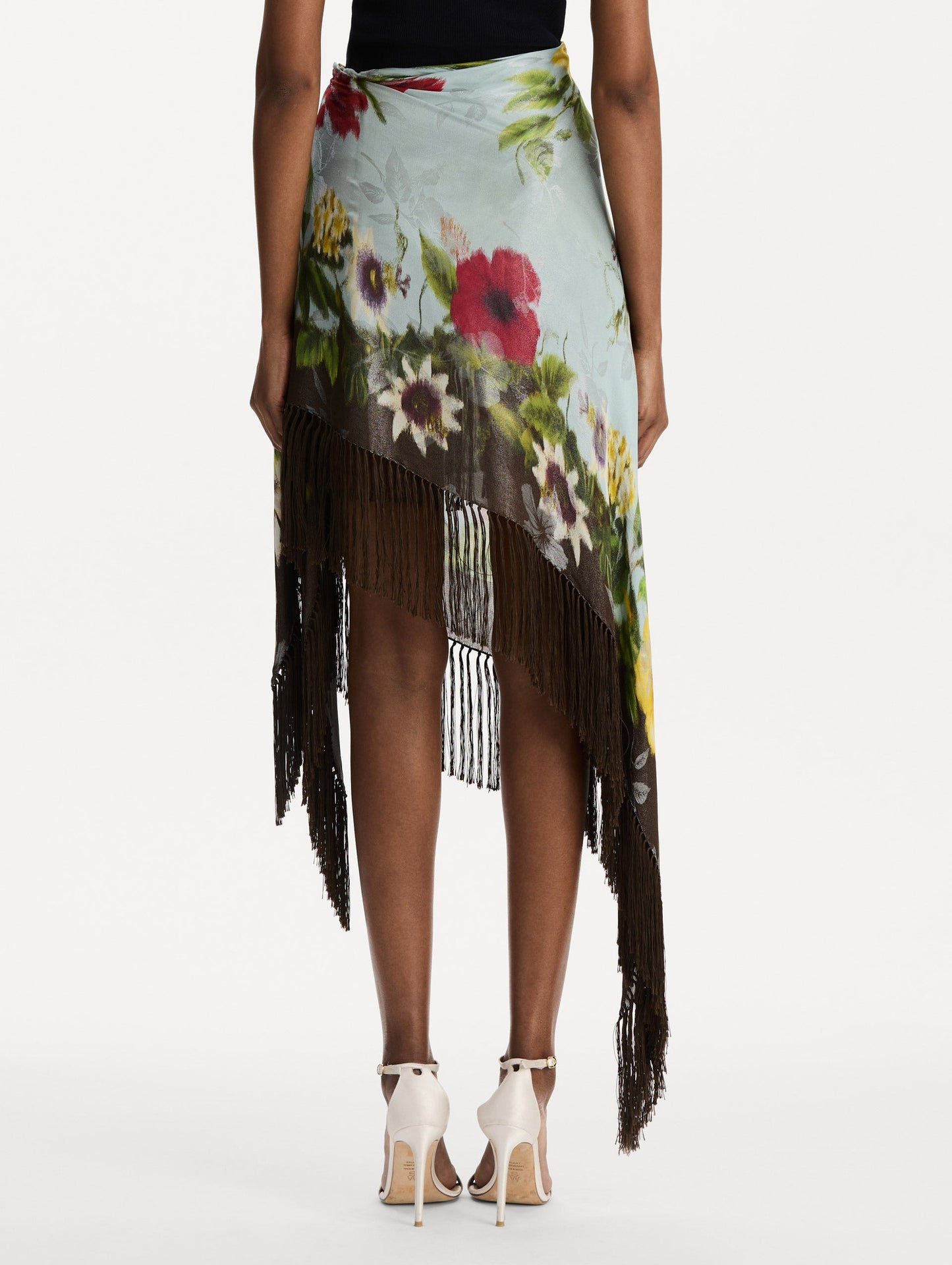 Dominican Mixed-Floral Fringe Skirt in Light Blue Multi. Back View.