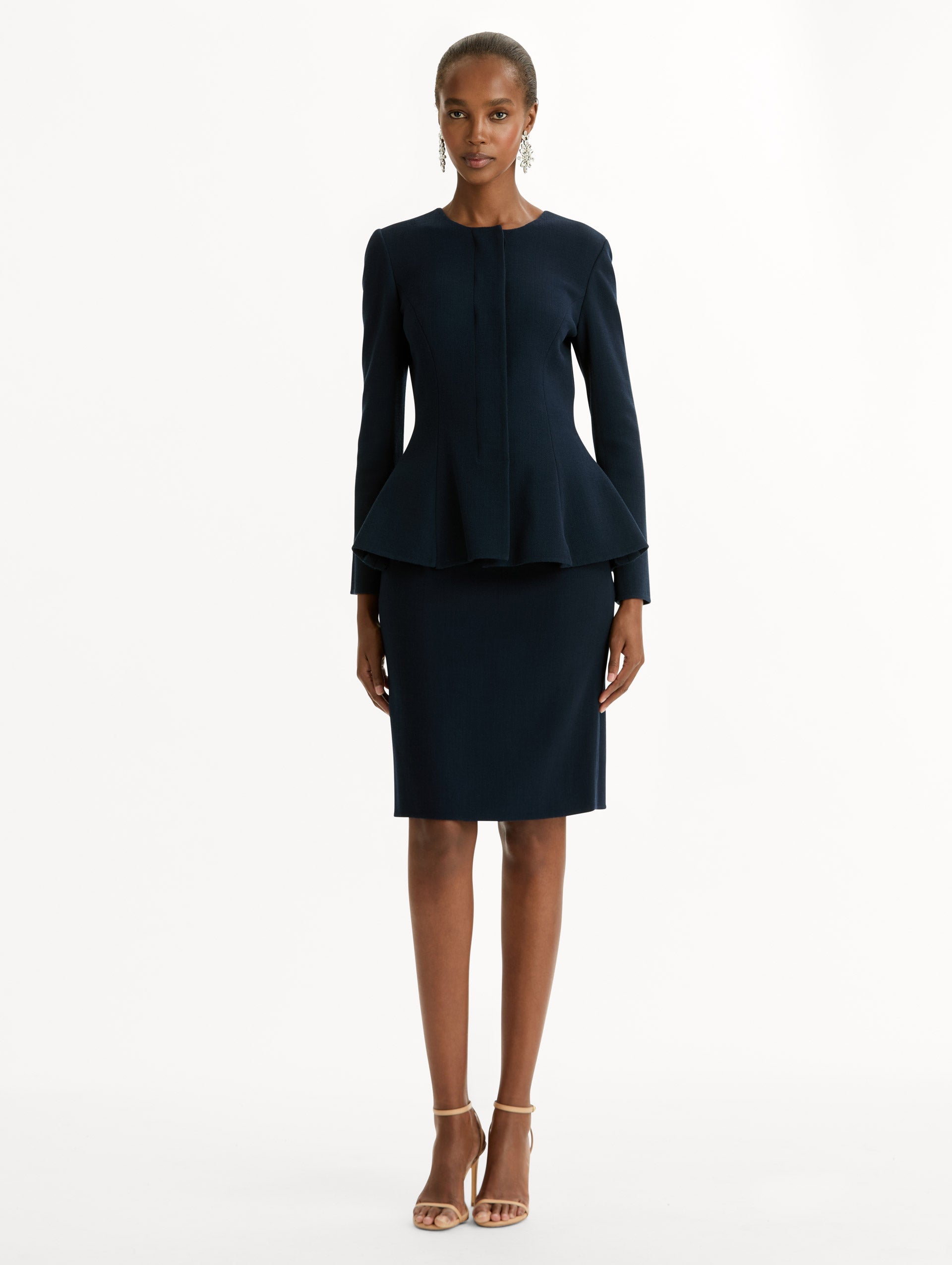 Peplum Wool-Blend Jacket in Navy. Front View.
