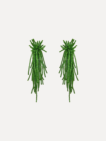 The Firework Tassel Earrings in the color fern.