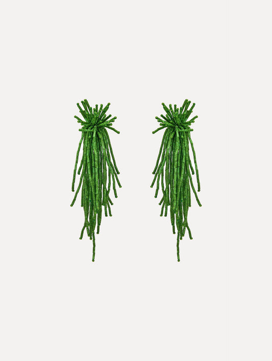 The Firework Tassel Earrings in the color fern.