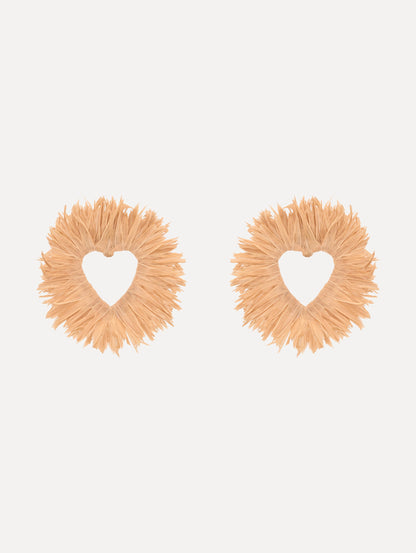 The Raffia Heart Earrings with heart cut-out center. Front View.