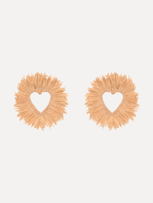 The Raffia Heart Earrings with heart cut-out center. Front View.