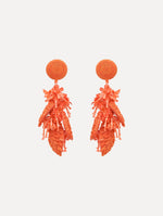The Raffia Tassel Bouquet Clip-On Earrings in Orange. Front View.