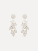 The Raffia Tassel Bouquet Clip-On Earrings in White. Front View.