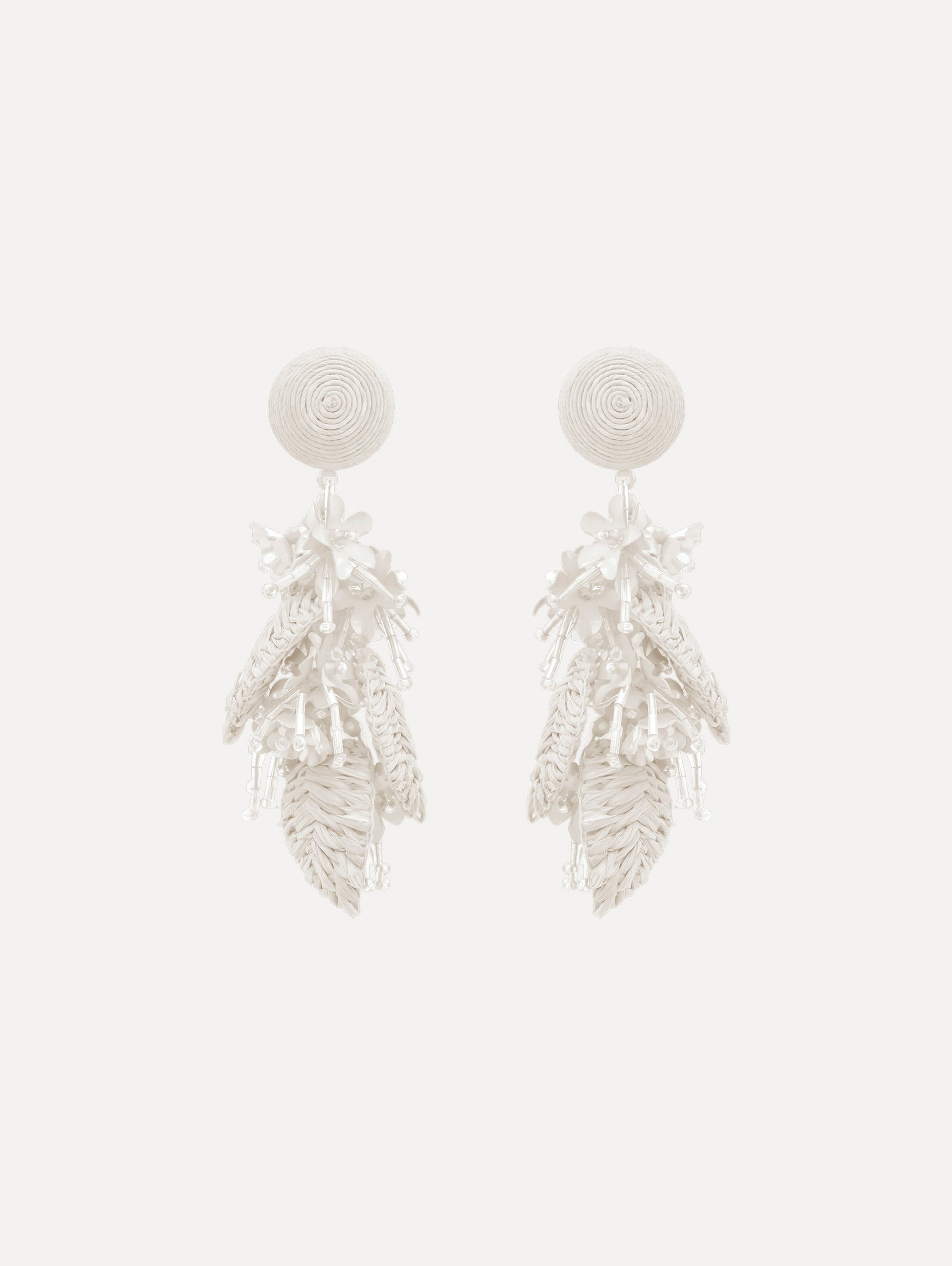 The Raffia Tassel Bouquet Clip-On Earrings in White. Front View.