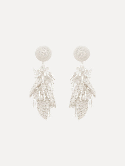 The Raffia Tassel Bouquet Clip-On Earrings in White. Front View.